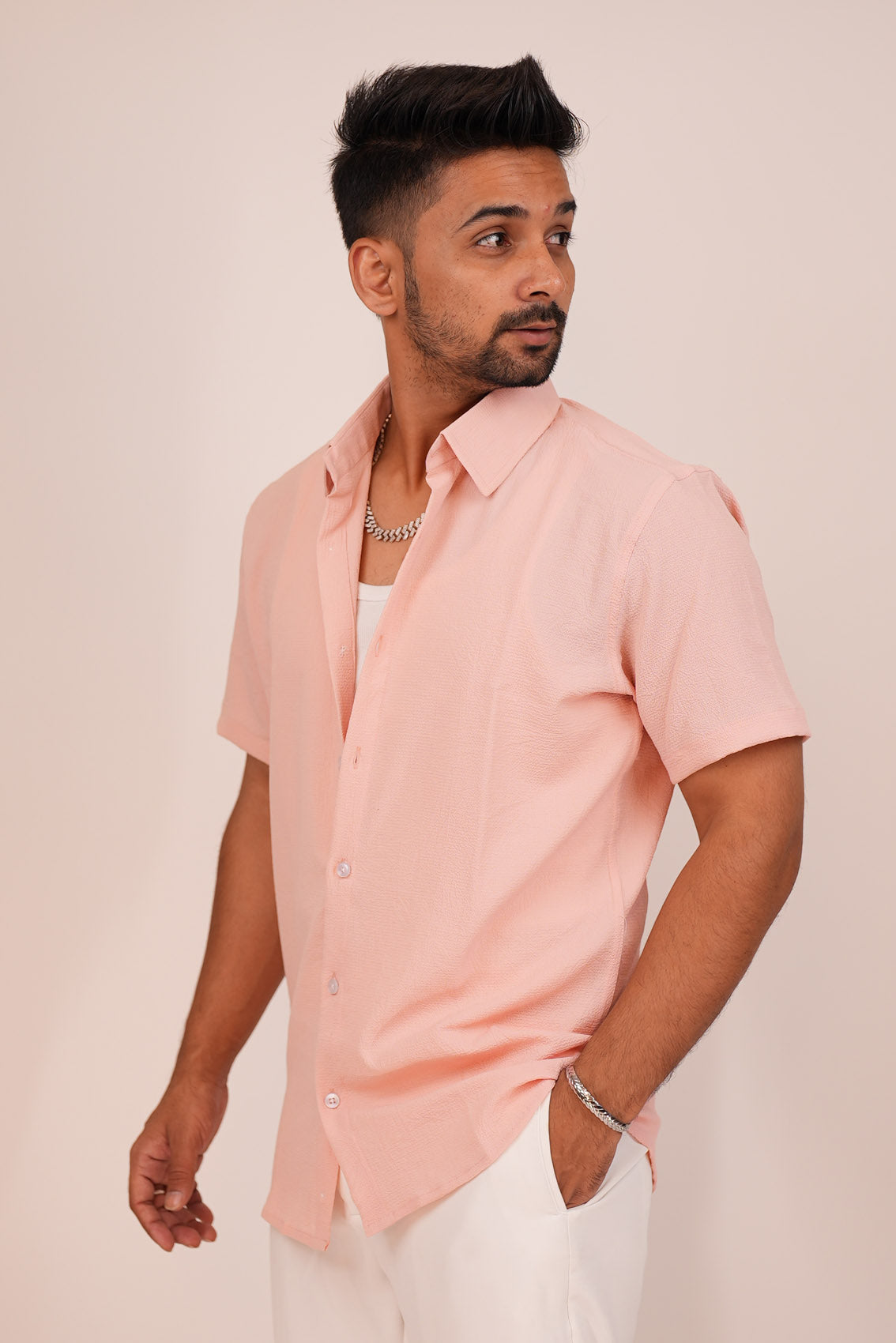 peach color shirt